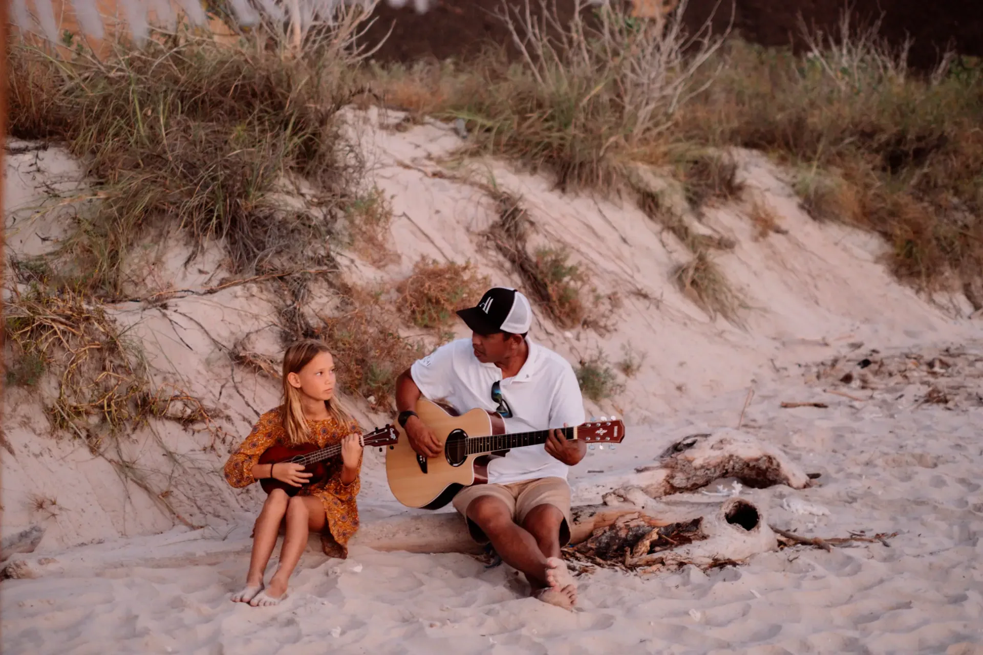 Island moments with guitar on the beach