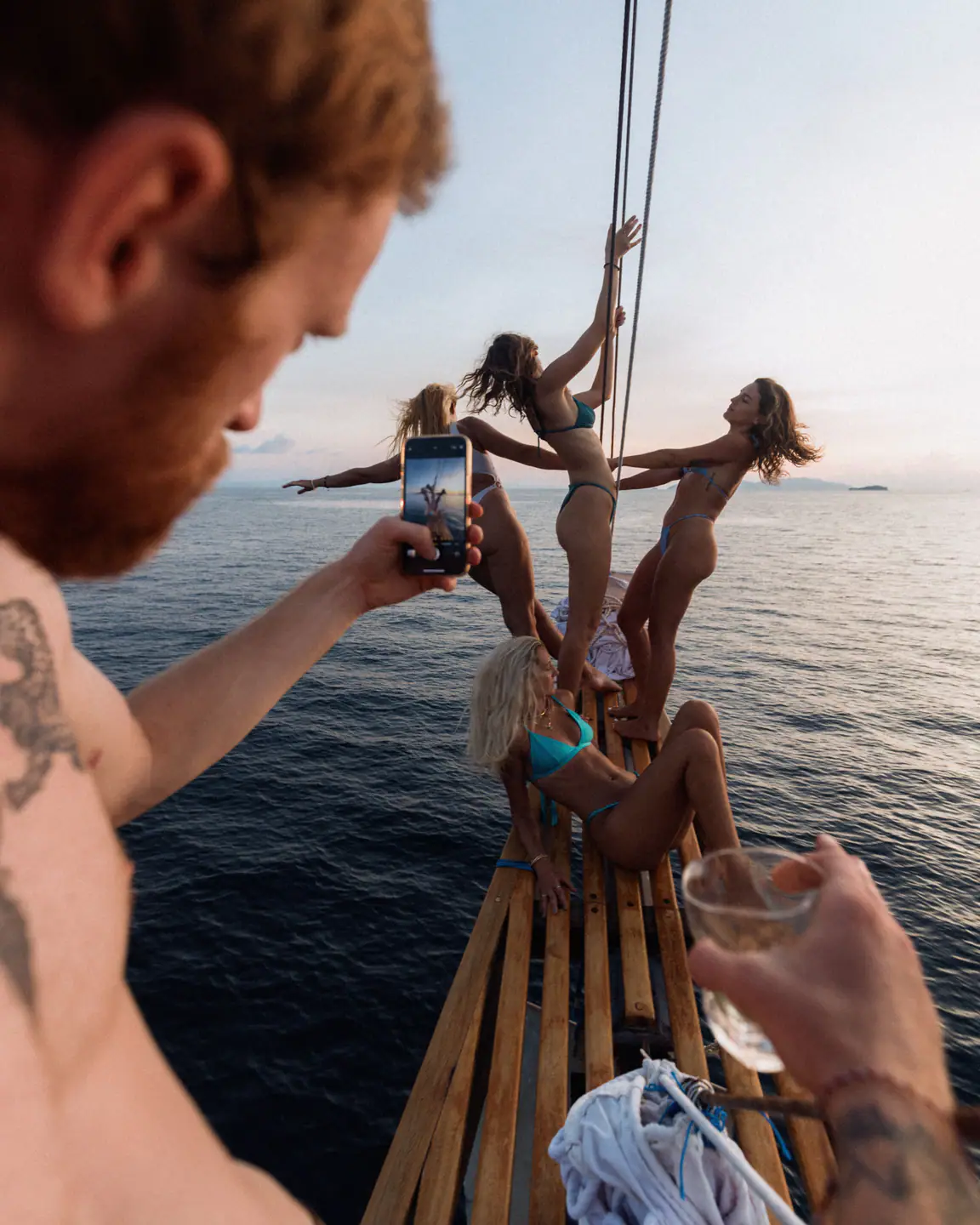 Fun on the bowsprit at sunset