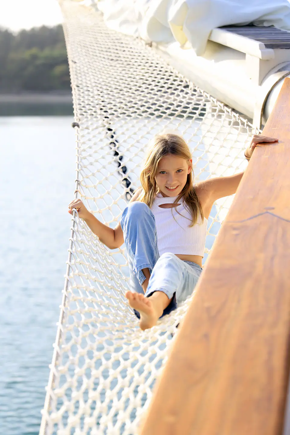 Kids having fun on the bow net
