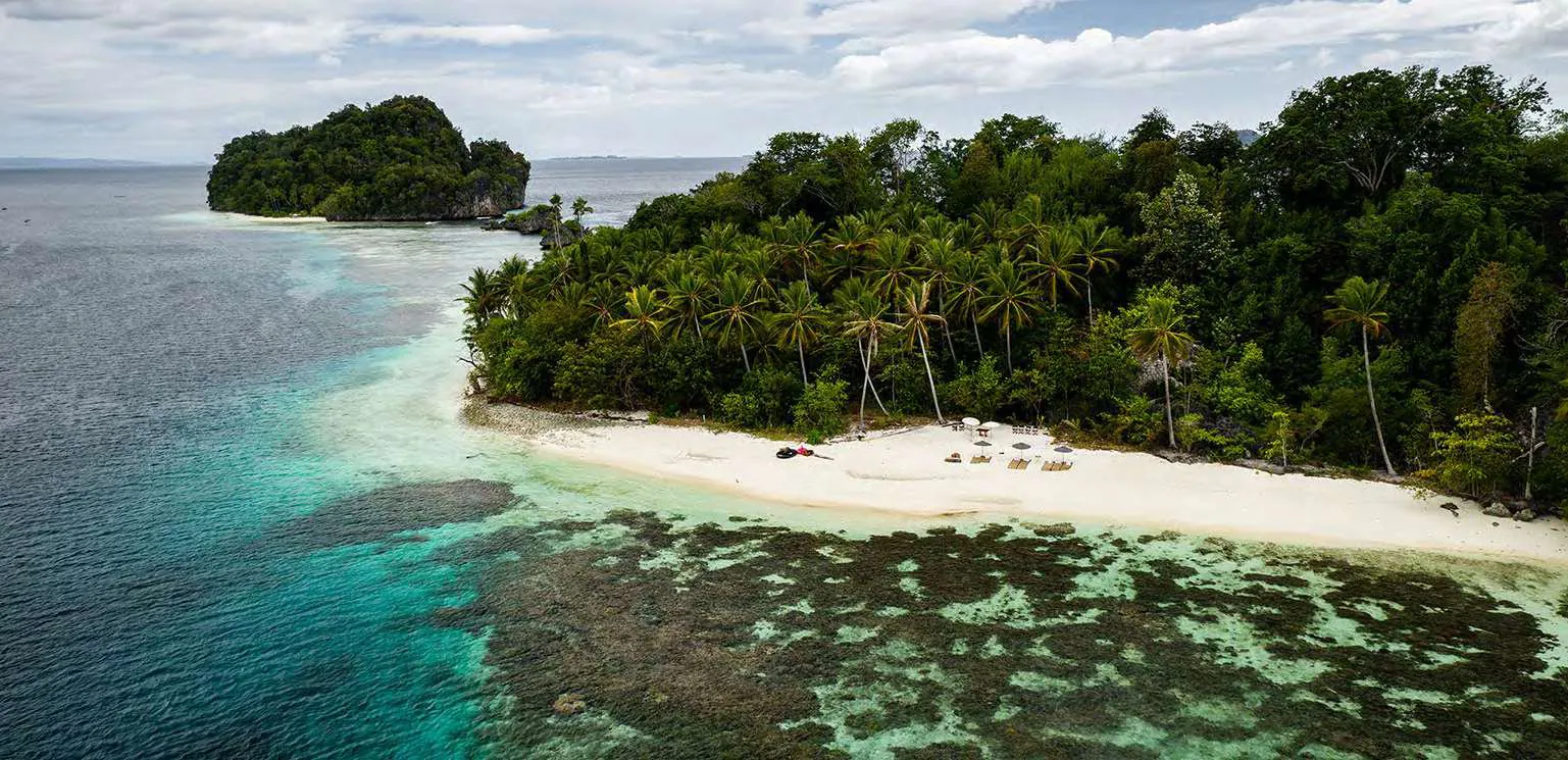 Luxury phinisi anchored in Raja Ampat in December
